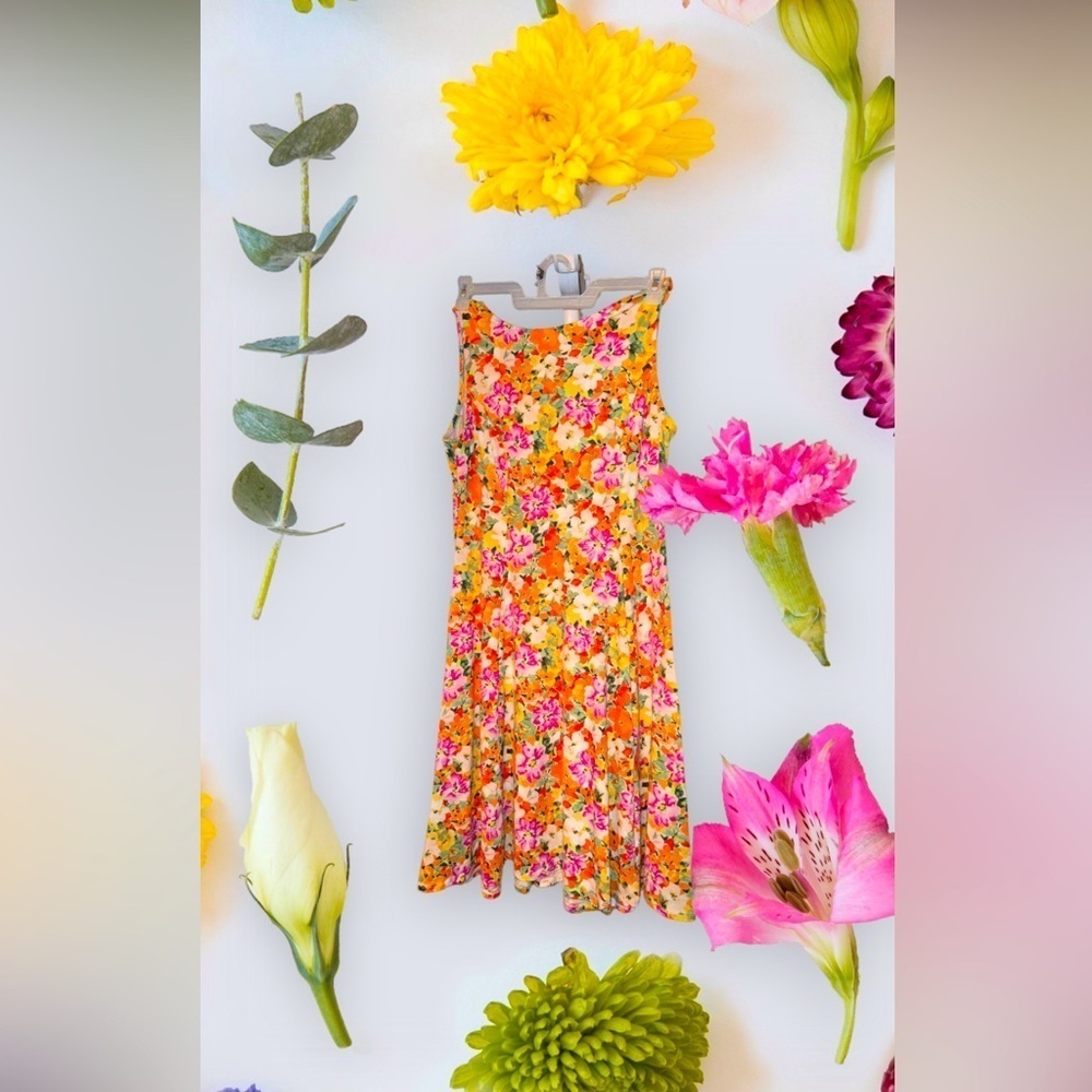 Tiana trapeze floral print sleeveless midi dress.